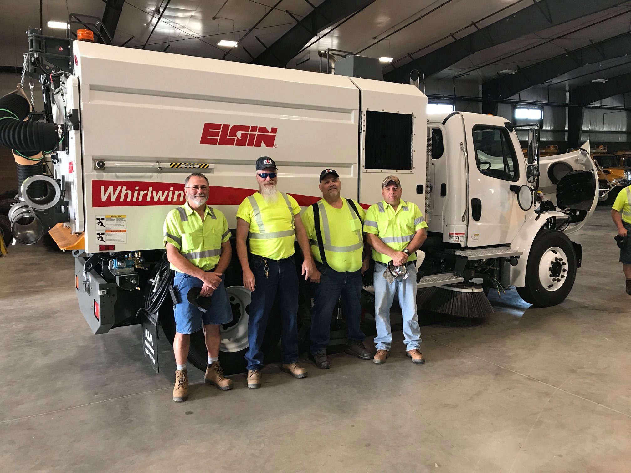 DOVER TOWNSHIP PUBLIC WORKS CREW WITH THEIR NEW ELGIN WHIRLWIND SWEEPER